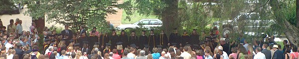 Time Honored Tradition: Graduates circle around the senior oak to sing "Tell Me Why."