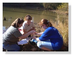 Kim Autry, Mary Walden and Manda Spencer learning water testing procedures